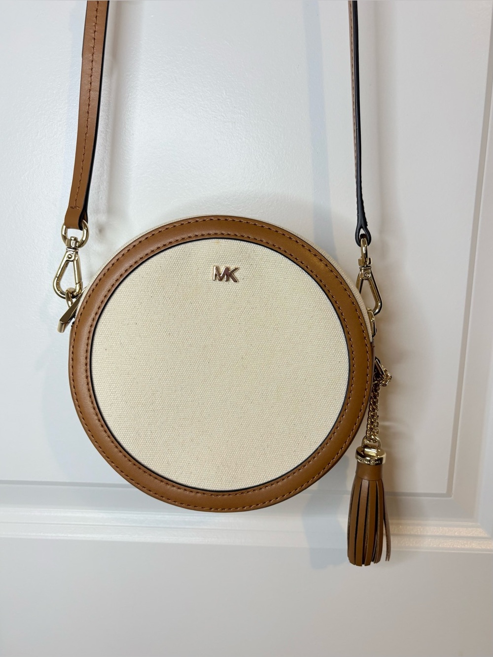 Michael Kors Tan & Cream Round Crossbody with Tassel